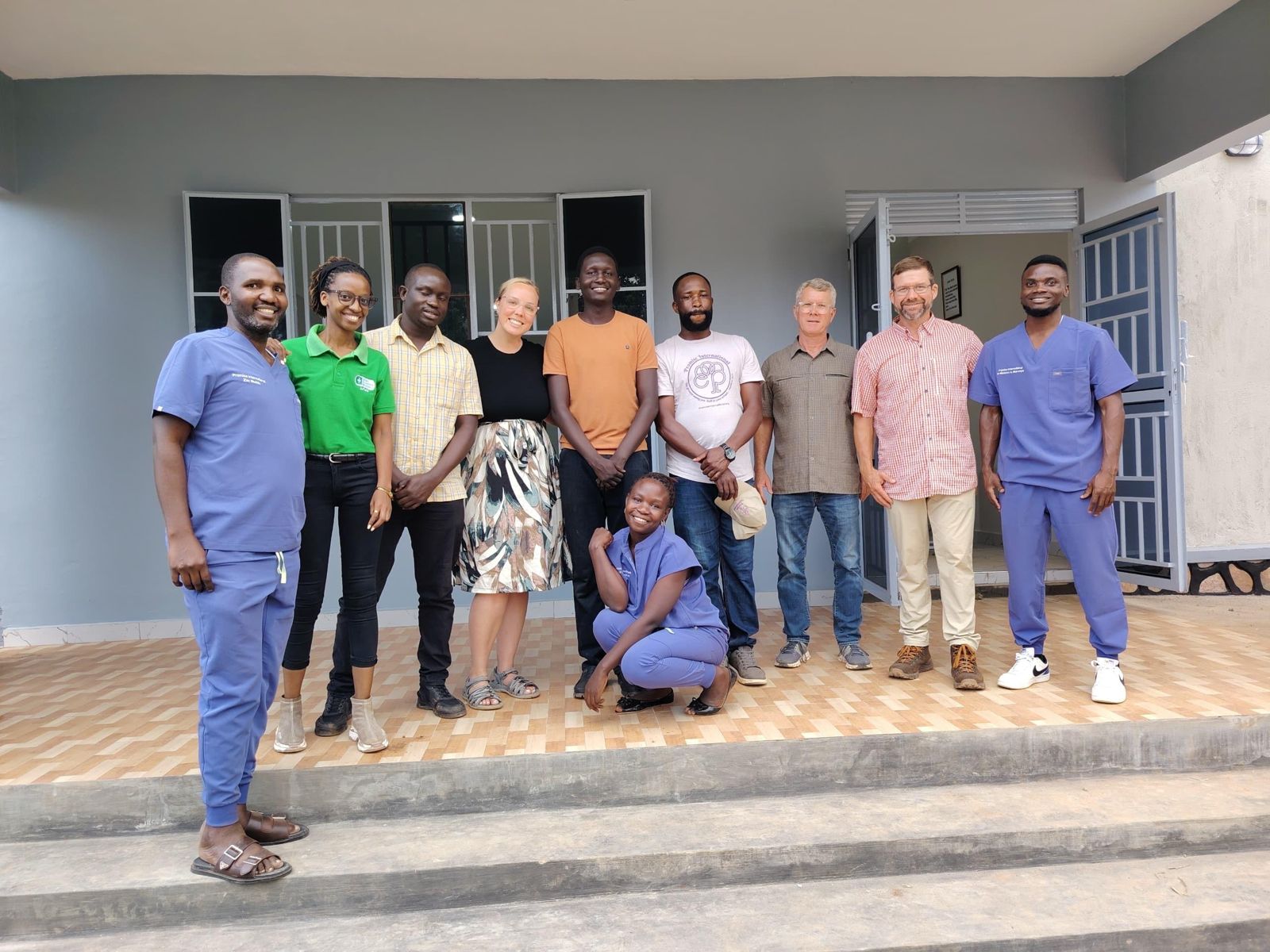 Our team with the facility's staff and partners at hand-over
